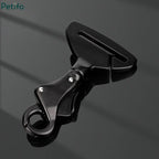 Petifo heavy-duty black metal dog seat belt clip adapter on dark reflective background