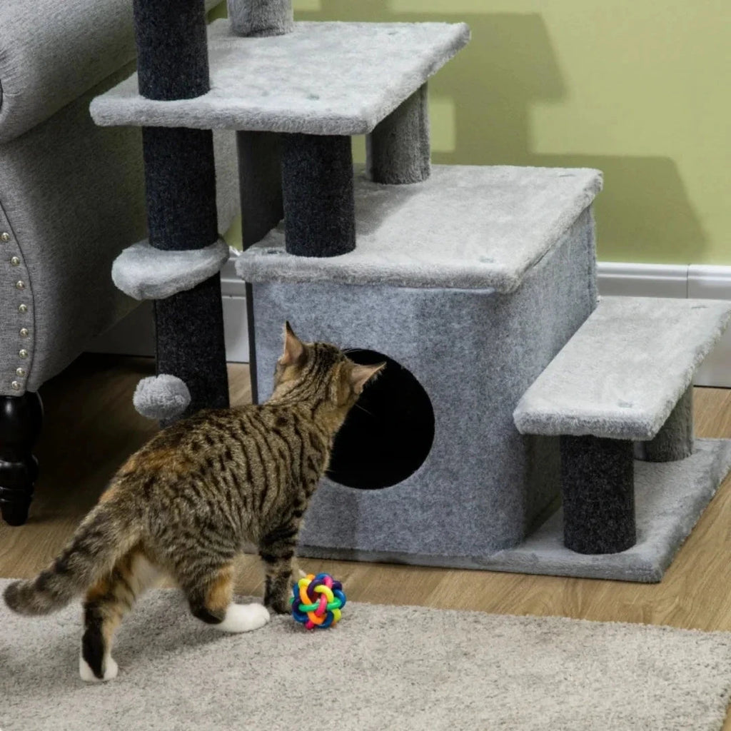 Cat using the grey PawHut 3-in-1 cat stairs and cave - Petifo