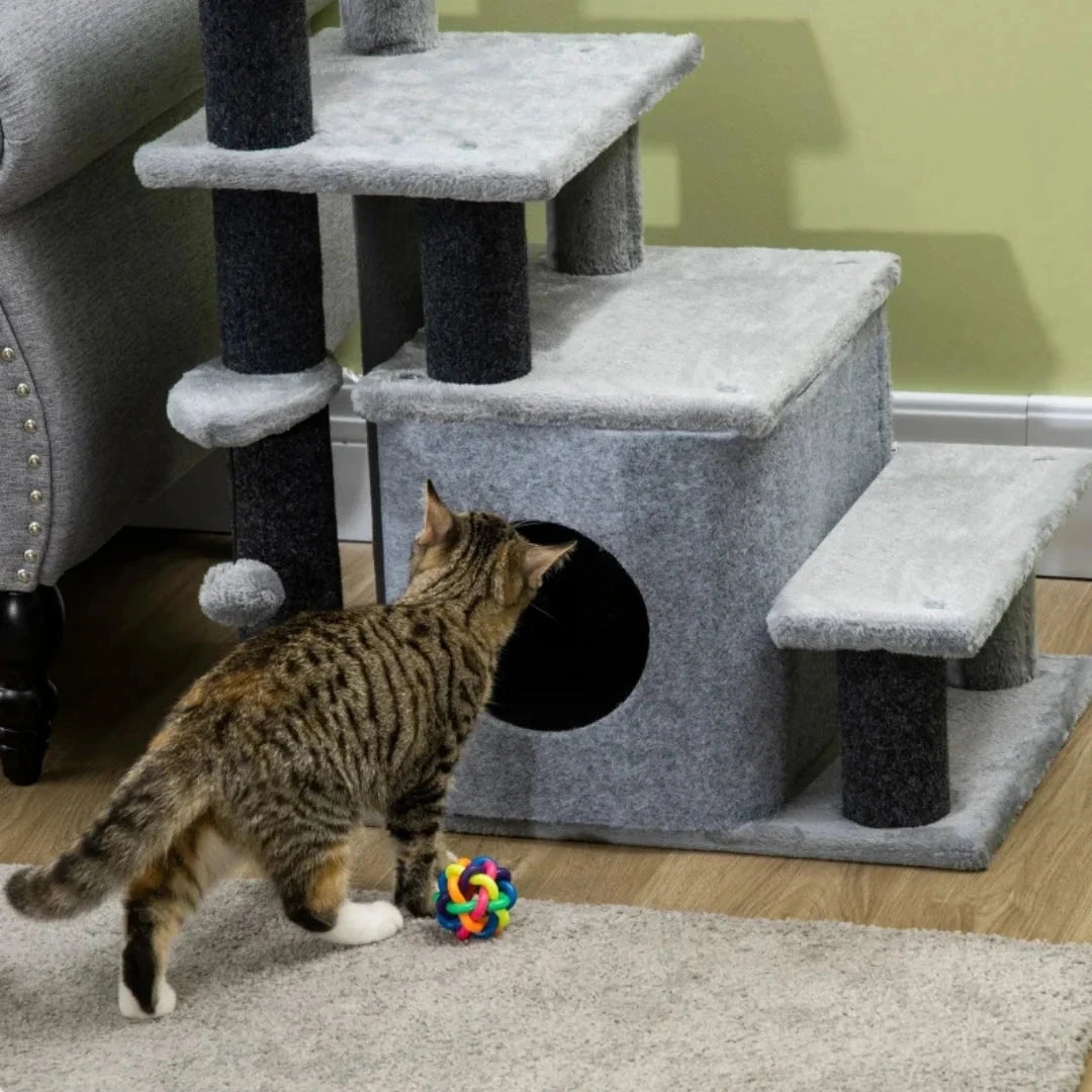 Cat using the grey PawHut 3-in-1 cat stairs and cave - Petifo